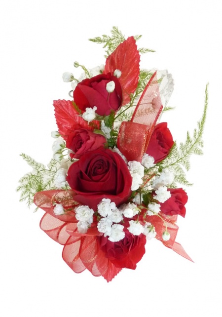 A beautiful corsage made of Crimson red flowers and white accents.
